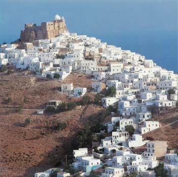 The beginning of the village was formed in a natural amphitheater a bay which is the main port of the island.