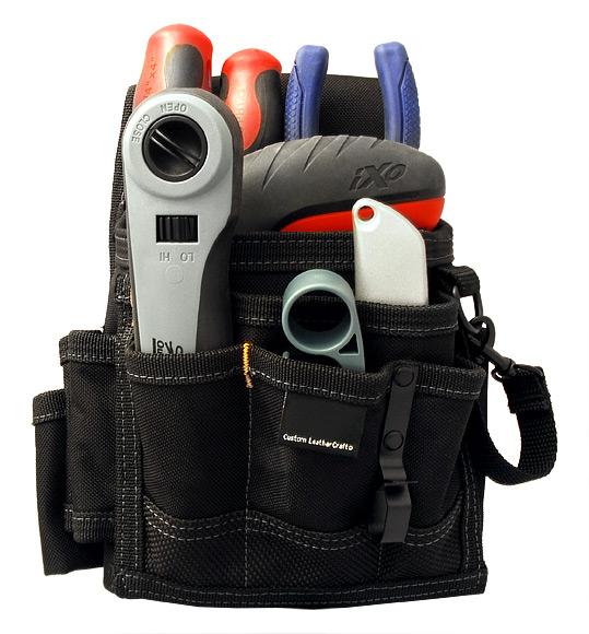 Durable 600D polyester construction. 3 Internal pocket sleeves and 6 external pockets. Detachable electrical tape sling.