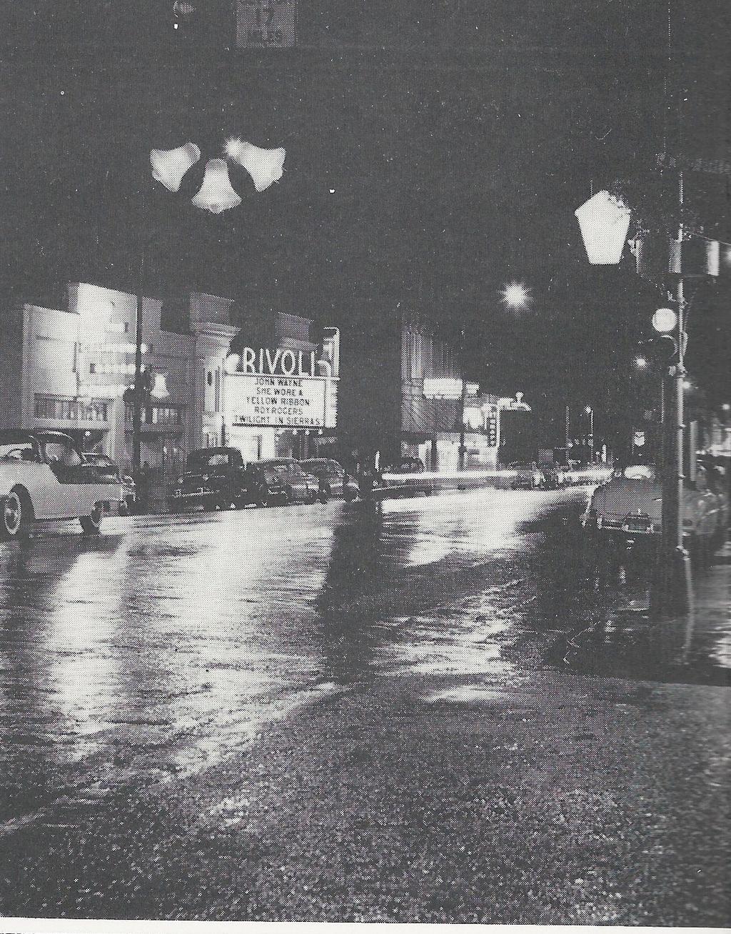 Page 4 Upper left: Rivoli Theater at night when 6th Street was a two-way street. Building is gone. Above: Entry to Josephine County Fairgrounds.