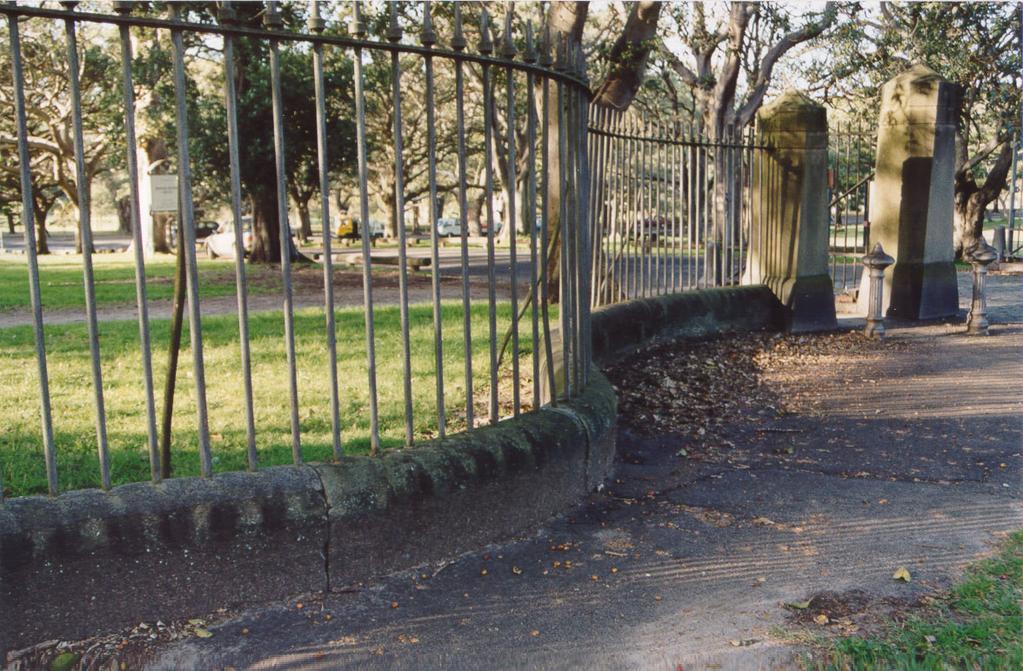 A wrought iron fence surrounded it.