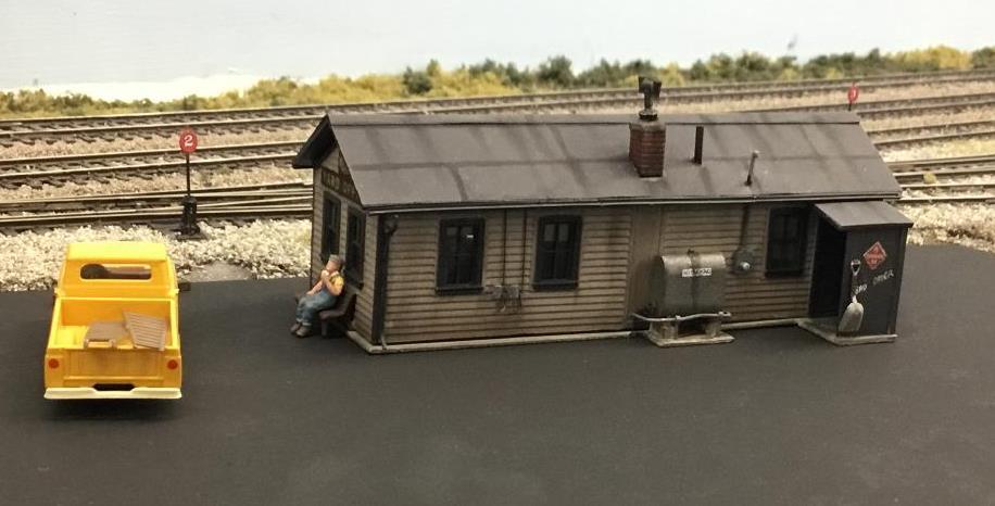 Steve took an inexpensive AM Model (see photos) yard office building, added many inexpensive detail parts, plus some scratch built add-ons to make the show piece you see in this article.