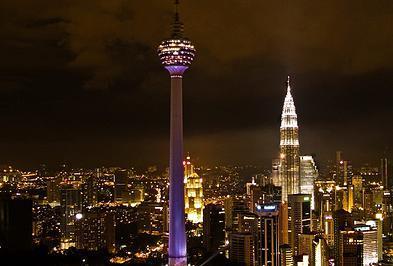 Halt for pictures at the Petronas Twin Towers in all its glory & visit the chocolate factory outle, drive pass the National Mosque, photo stop at