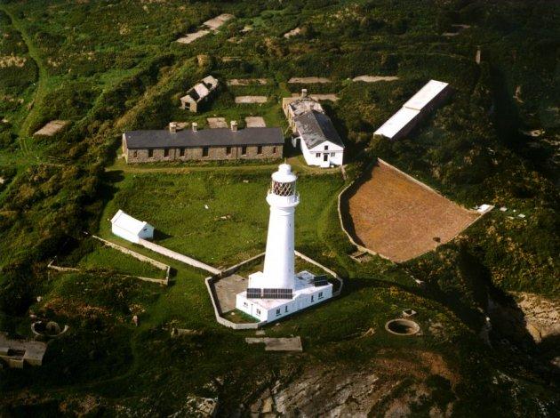 Flatholm Island Lighthouse (Island of Flatholm in the Bristol Channel, Cardiff, Wales) History The Island of Flatholm lies centrally in the busy shipping lanes where the Bristol Channel meets the