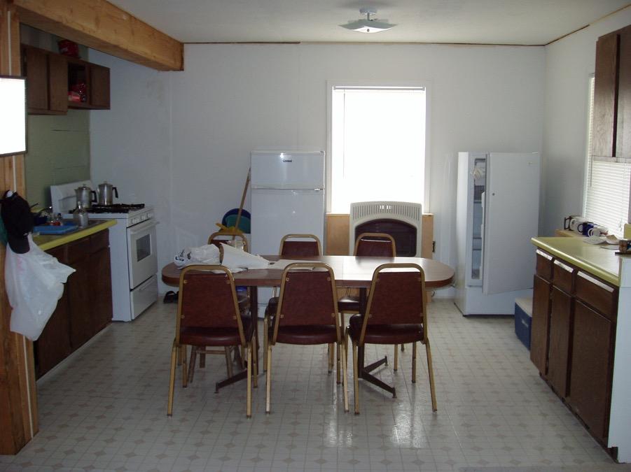 Here is the kitchen. There is a 250-gallon propane tank to serve the range, space heater, and refrigerators.