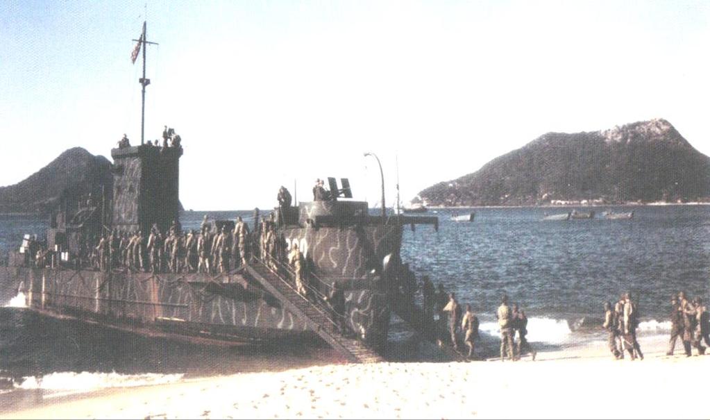 American soldiers boarding a landing ship in Sh