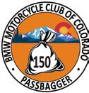 The idea is to ride to the top of a Colorado pass, have the rider and his/her bike photographed in front of the marker identifying