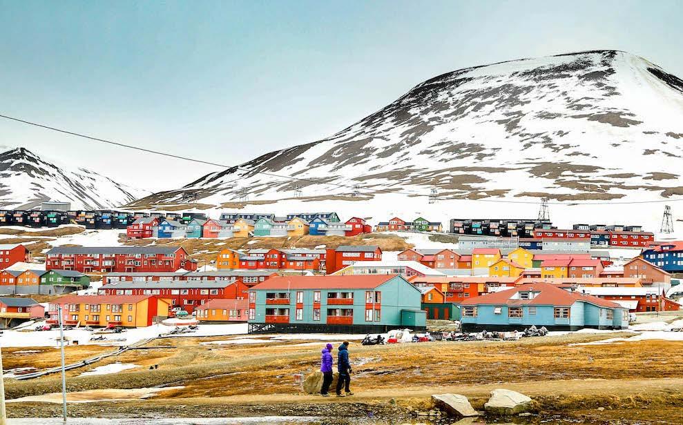 In the Svalbard capital, learn about the archipelago s storied past at the museum, wander between colorful wooden houses and grab