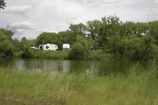 Prairie Oasis Tourist Complex Besant Park Campground 75 Pull-Through RV trailer spaces with full hook-up, 25 additional with water, electricity, wireless internet, tenting area adjacent to our