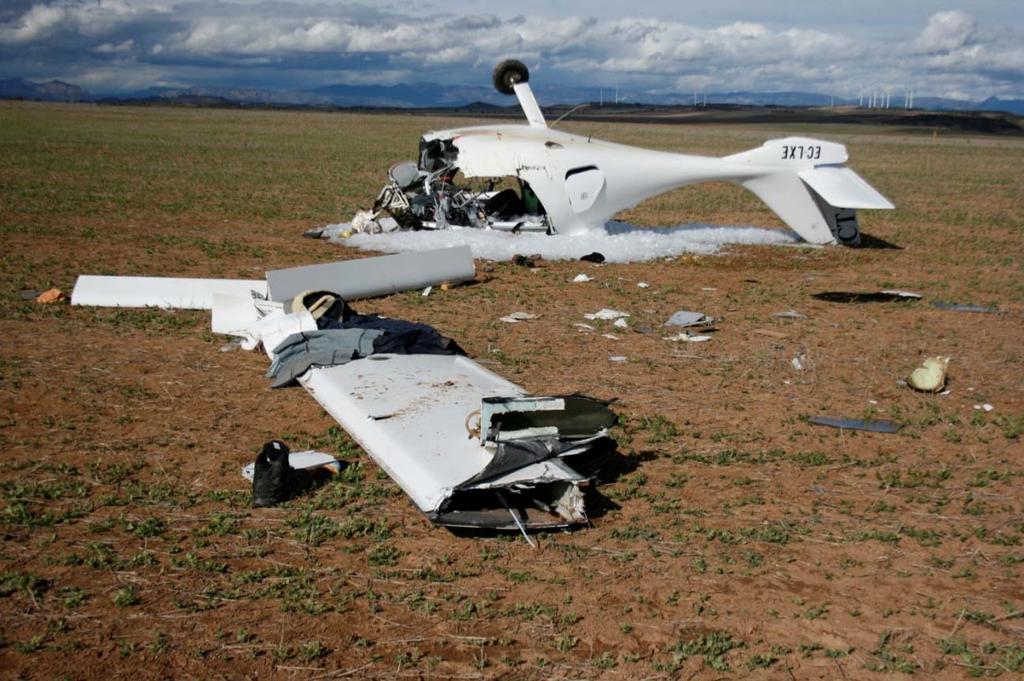 1.12. Wreckage and impact information The aircraft crashed in farmland next to the aerodrome, some 100 m to the right of runway 30.