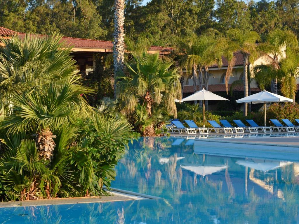 Reasons why we love Club Med Napitia Lazing on the beach after a walk through the pine trees and bougainvillea Enjoying a drink or dining in the Mediterreanean-look bars and restaurants Seeing your