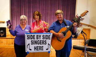 Page 2 Do you love to sing informally in a group? Enjoy old favorites such as Take Me Out to the Ballgame and This Land is Your Land? Come sing with us at Side by Side Singing this summer!