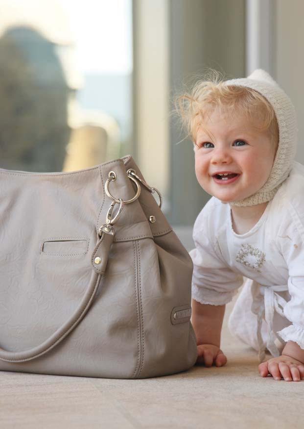 SLING Nougat /Truffle the city sling Dimensions: 38W x 31H x 13 gusset cm Soft, luxurious and robust, leather look outer Wipeable exterior Alternative carry options - adjustable pram strap or hand
