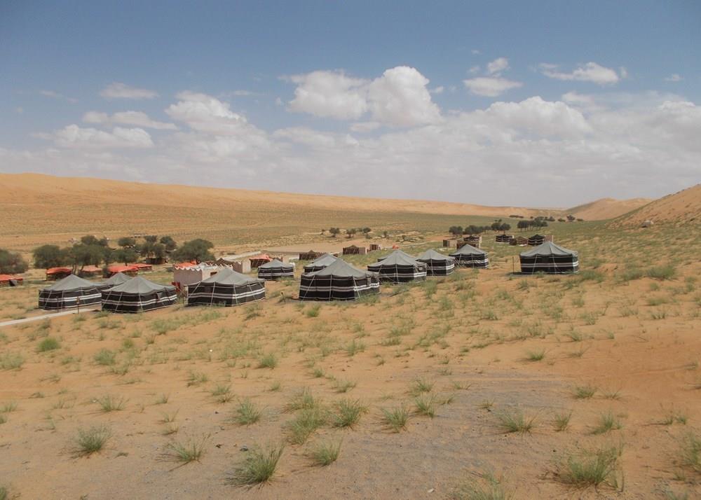 Accommodation 1000 NIGHTS DESERT CAMP, WAHIBA SANDS Basic The 1000 Nights camp is a larger camp (60 tents in all and two permanent guest houses that make up the four 'sand house' accommodations),