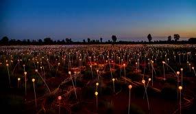 His Field of Light, inspired by a trip to Uluru over 27 years ago, is installed in a remote desert area within sight of majestic Uluru.