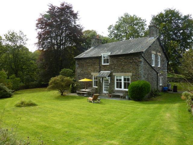Whinfell is an impressive detached family house built around 1905 in local stone, under a Westmorland slate roof.