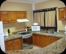 Our Resort VILLAS DESCRIPTION 2-BDRM VILLAS (sleep 6): This unit has a Queen size bed, 2-Double beds and a Queen size Futon, 2 full bathrooms, full kitchen, living room and a large balcony with the