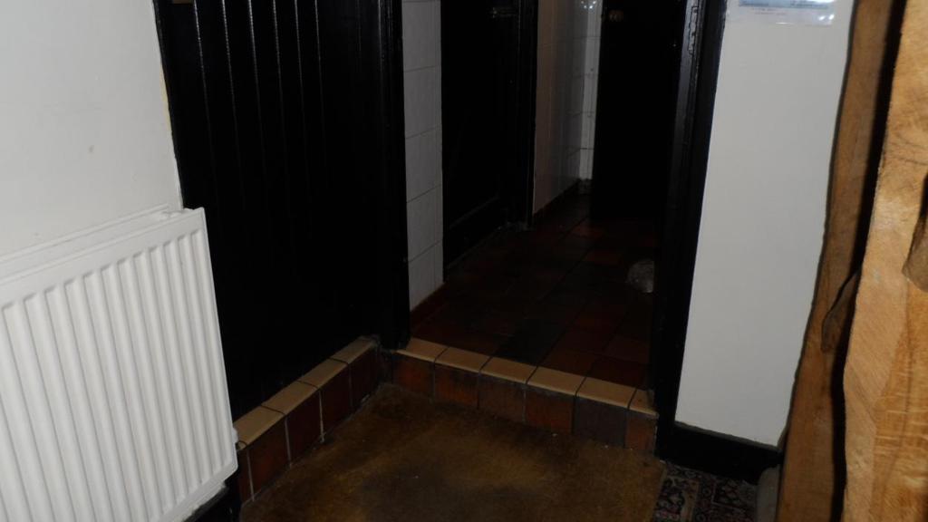 Customer Toilets Gents & Ladies W.C. s are both located to the rear of the Main Bar with 1 small step access & then are on a level: All W.C. s have coarse quarry tile flooring & good bright overhead permanent lighting.