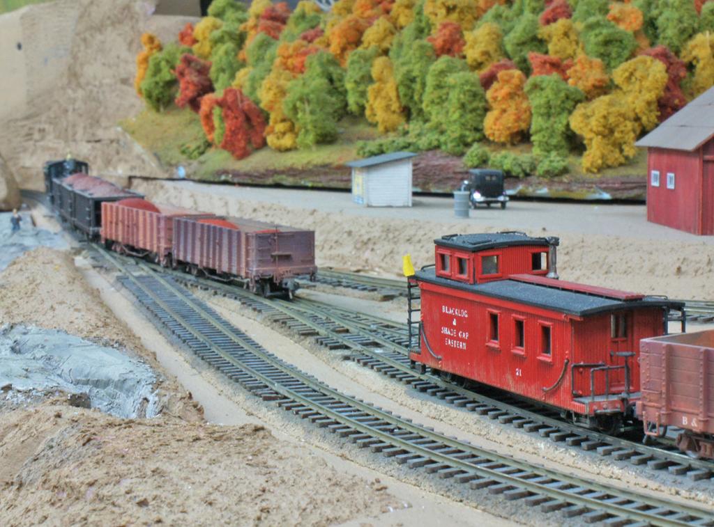 The 70 coaches were built from JCModels kits, assembled using Zap-A-Gap glue and painted with Floquil and acrylic paints.