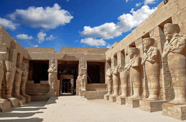 A sacred city devoted to the cult of Amun- Re, Karnak is a gigantic sanctuary dedicated to the Theban Triad. Karnak is the modern-day name for the ancient site of the Temple of Amun at Thebes, Egypt.