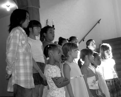 The children will sing at the opening concert Saturday evening, Aug.