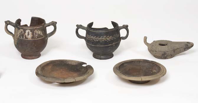 catalogue 101 Figure 20. Pyre 2, ca. 225. Back row: P 28582, P 28581 (kantharoi), L 5667 (lamp). Front row: 28584, P 28583 (plates). Coin and bronze tool not illustrated.