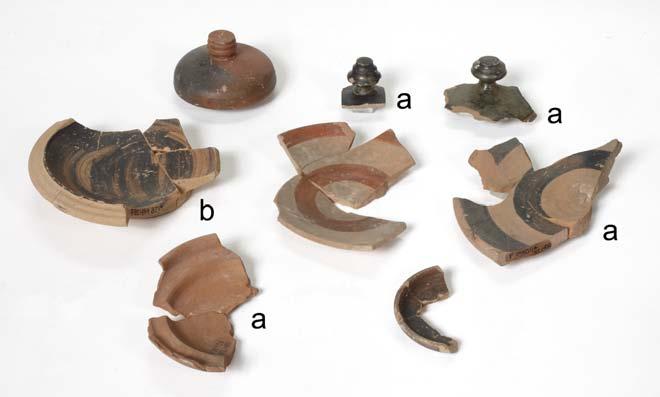 118 catalogue building cannot be determined. Some pottery shows signs of burning, and pottery is described as set into a burnt fill, suggesting burning in situ.