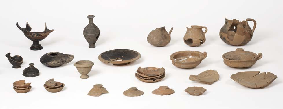 catalogue 121 soil), two ribbon-handled plates, rilled-rim plate, two large saucers, 14 small saucers, chytridion (cooking ware), lopadion (cooking ware), two bronze coins (one of Eleusis, Agora