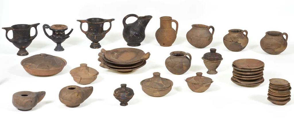 catalogue 159 Figure 91. Pyre 46, 285 275. Back row: P 18570 (kantharos), P 18572 (cup-kantharos), P 18571 (kantharos), P 18573 (askos), P 18580 (jug), P 18583, P 18585, P 18582 (chytridia).