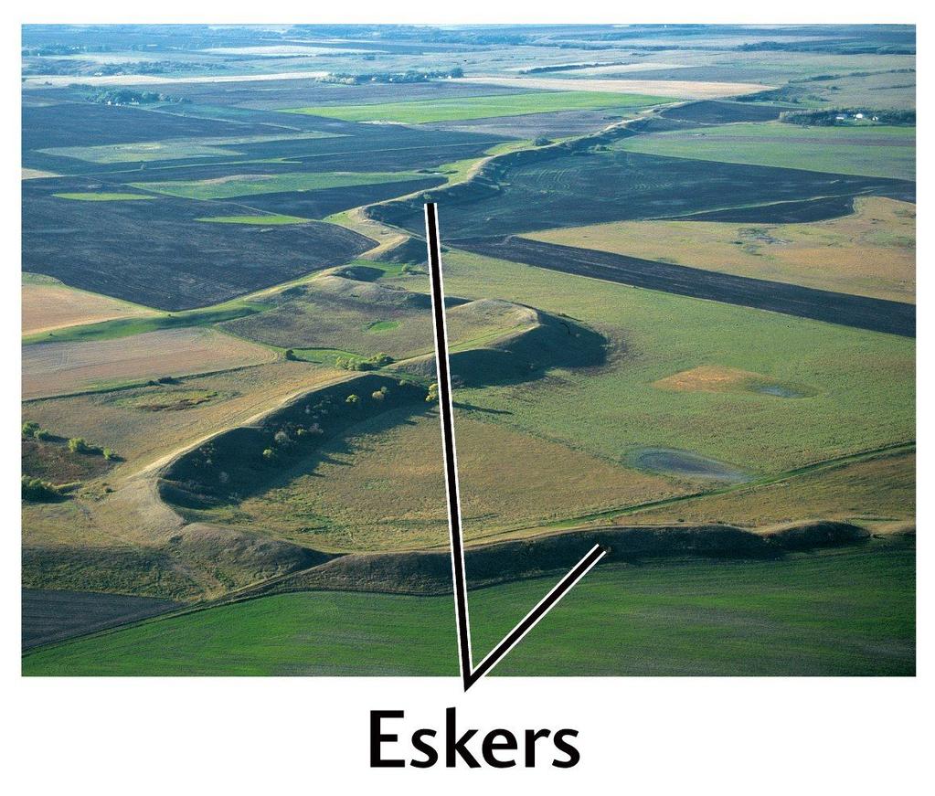 Esker An esker is a long, winding ridge of stratified sand and gravel which formed in a glacial