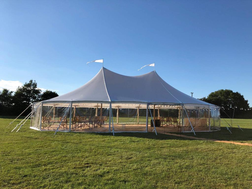 2 POLE HAMPTON 14 METERS X 20 METERS A GREAT SIZE FOR UP TO 150 GUESTS WITH ROOM FOR DANCEFLOOR OR BAR. Please ask for further guidance on how much room to allow for your guest number.