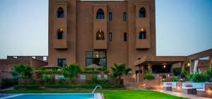Riad dar Chamaa are per person travelling. 'Twin/Double' In the classic kasbah style, Riad dar Chamaa is set within the Ouarzazate palm grove with fantatsic views of the surrounding Atlas mountains.