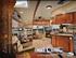 YOUR ULTIMATE CHOICE IN DESTINATION CAMPING. 408 FLFB KITCHEN / LIVING ROOM [above] Saddle interior with Vigor Cherry wood