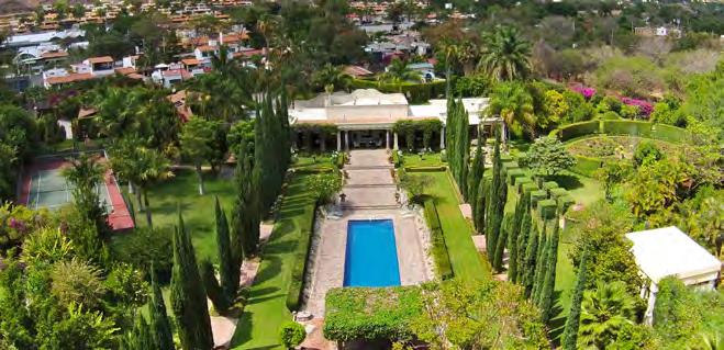The property offers a walk through spectacular gardens created by