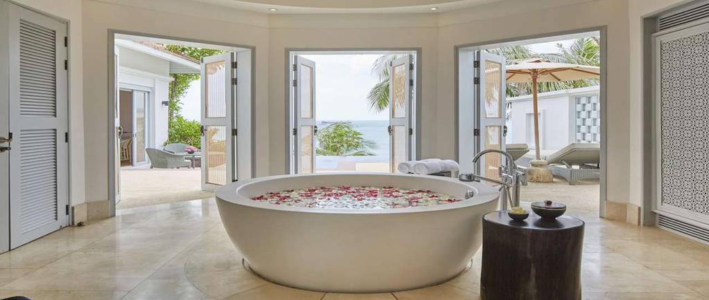Ocean pool villa (150 sqm) Features an individual bedroom with a king size bed, an oversize bathroom and an adjoining living room with a large opium sofa.