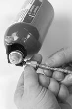 Hand tighten the connection (Fig. 13). Place thumb over hole in PUMP KNOB and pump approximately 40 full strokes (Fig 14).