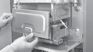 Techninis aptarnavimas Šildymo sistemos kaitrinio bloko šilumokaičio valymas viršutiniai greitai įveržiami užraktai Šildymo prietaisą išjunkite taip, kaip aprašyta skyrelyje "techninio aptarnavimo