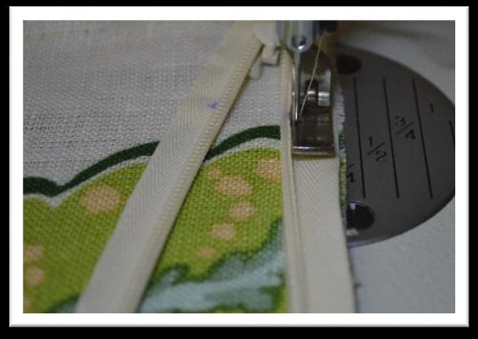 know everything is lining up correctly as you stitch. Open the zipper.