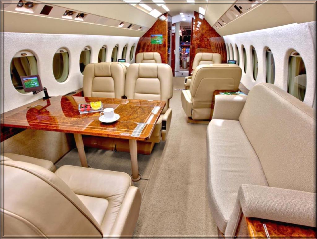 Bill Costa INTERIOR Updated August 2010 By Duncan Aviation, 3 Crew Seats + 12 Passenger Seats. 3 Cabin Seating Areas Forward 4-Place Club, Mid-Cabin Conference Stg Group Opposite.