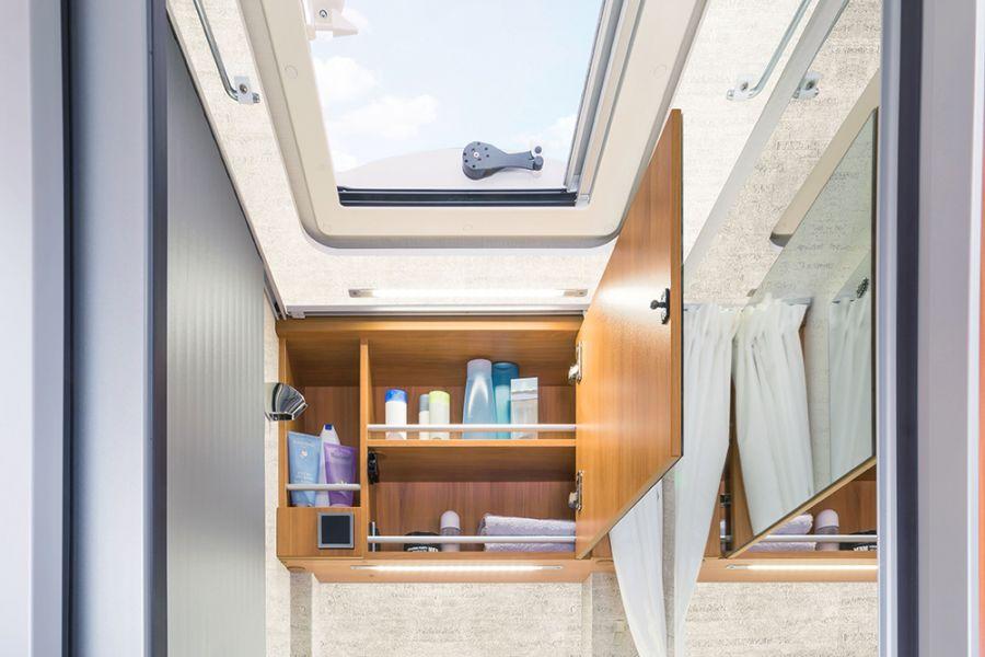 Compact daylight bathroom The HYMER Van s compact bathroom comes with a standard mirror cabinet with plenty of storage space, and has a skylight to let in fresh air and daylight.