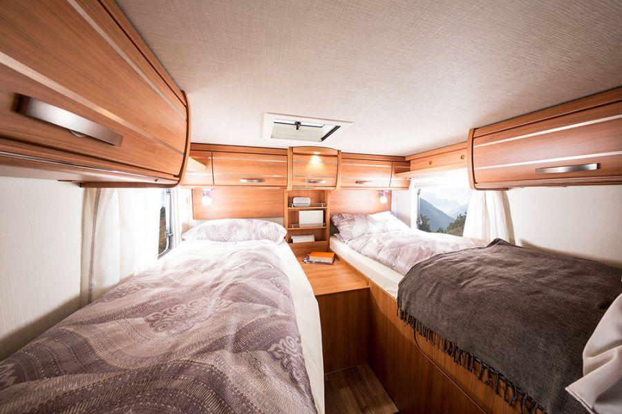 in the rear of the HYMER Van 374, the single beds pictured here in the Trentino