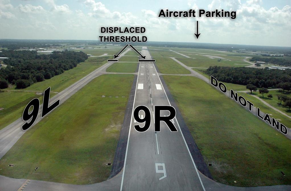 LANDING Runways 9L or 9R: DO NOT land on the main (wide) Runway 9R unless specifically instructed by the Control Tower.