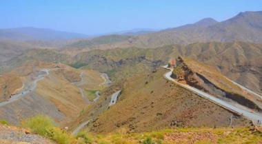 The incredible road up and over the High Atlas Mountains. On the right the road follows a razor back ridge. The Tizni-n-Tichka Pass is not far off now.