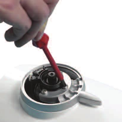 Insert a small flat headed screwdriver into the screwdriver slot taking care not to damage the surrounding plated surfaces and carefully remove the Aquastream Thermo control knob from the unit by