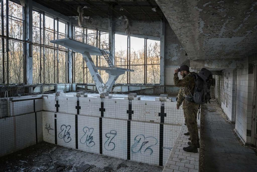 Jimmy in the abandoned pool of the ghost town of Pripyat.
