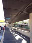 departures roadway metal roof canopy, including lighting and