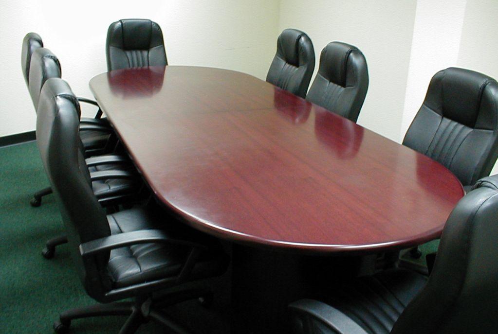 Item B-1.25 Tables Meeting Traditional boardroom tables with 8 chairs.