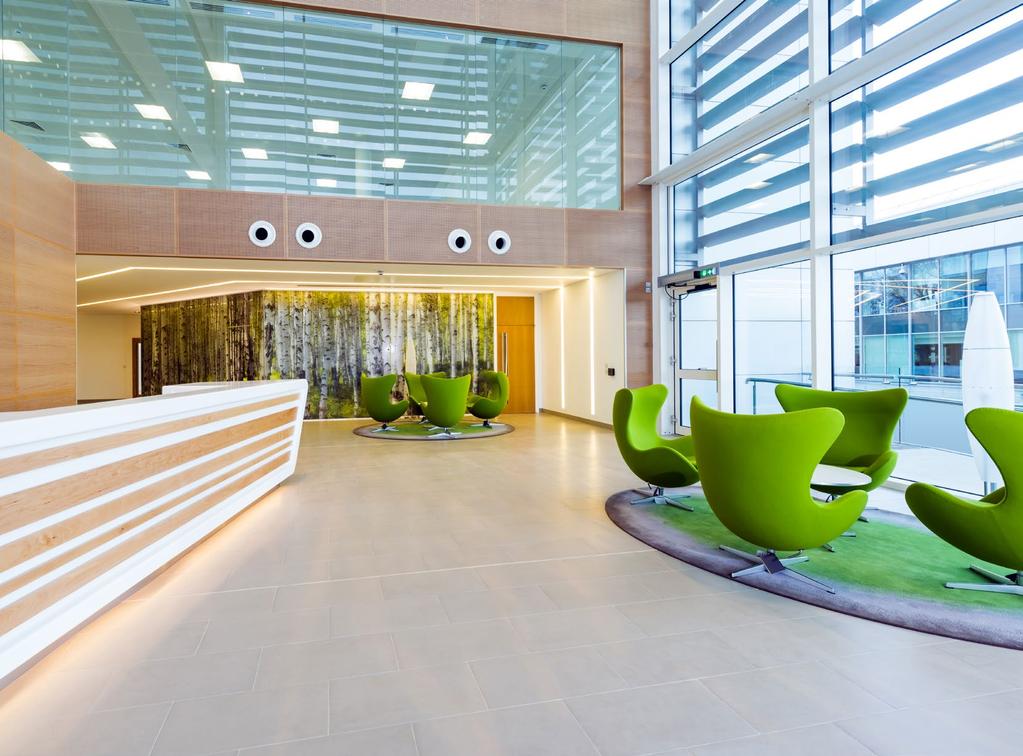 Arrivals Flooded with light and towering four storeys high, the grand atrium entrance offers an
