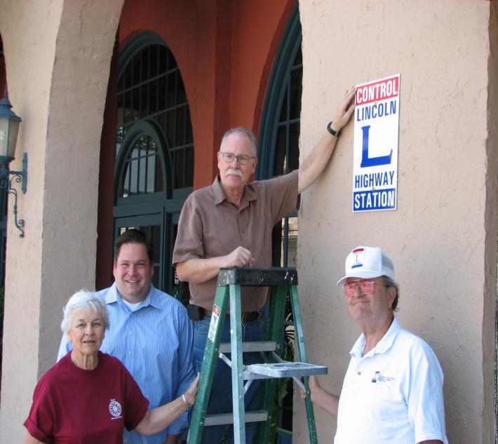 The owner of the Tracy Inn graciously allowed and provided for the installation of the sign at the front entrance to the Inn.