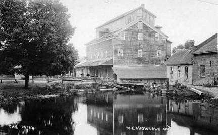 View of the mill and mill office opposite 7017 Old Mill Lane, c. 1900.