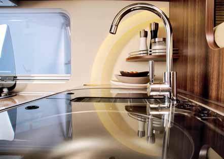 In the Elegance, for example, a glass cover allows the sink and draining board to be turned into a work surface area.